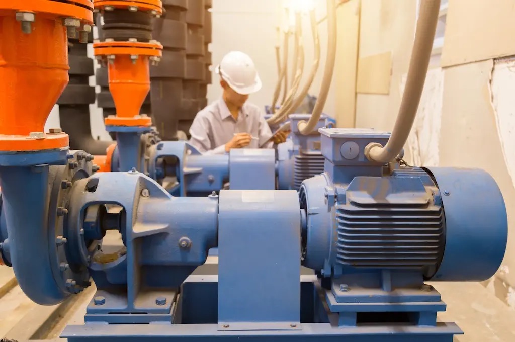 Industrial electrician performing on-site service work